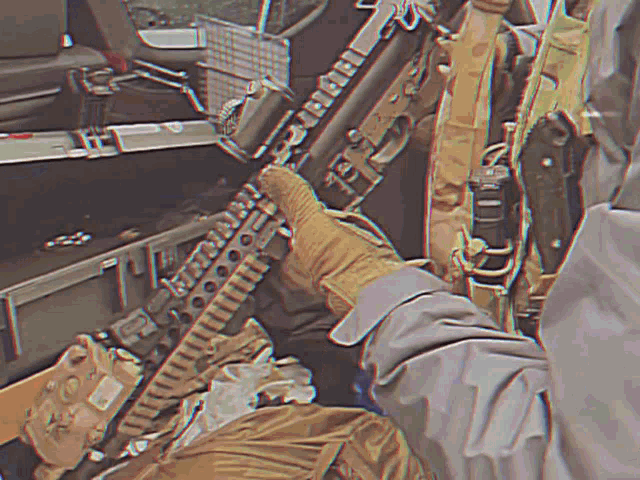 a close up of a person holding a rifle that says ' sniper ' on it