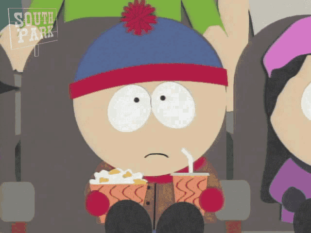stan marsh from south park eating popcorn and drinking a soda
