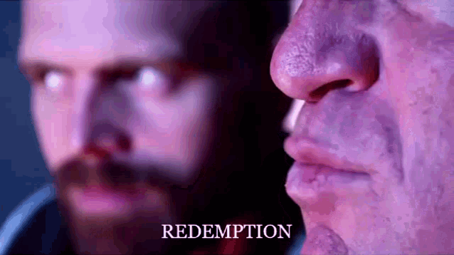 a close up of a man 's face with the word redemption written below it