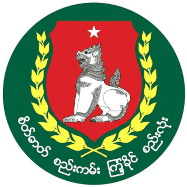 a green circle with a white lion on it