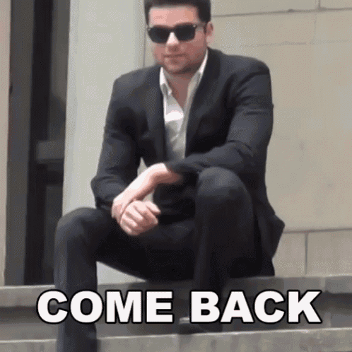 a man in a suit and sunglasses sits on a set of steps with the words come back written in white
