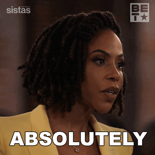 a woman in a yellow jacket says absolutely in front of a bet logo