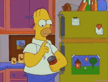 homer simpson is standing in front of a green refrigerator holding a can of soup .