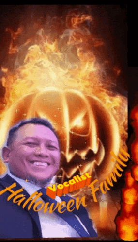 a man is smiling in front of a pumpkin with the words halloween family written on it