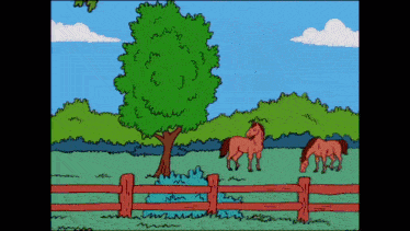 two horses grazing in a field with a red fence