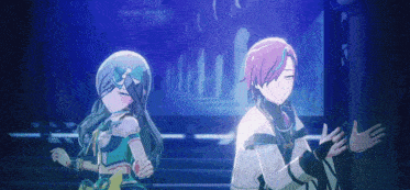 a boy and a girl are dancing together in a dark room .