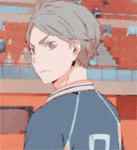 a man in a blue jersey with the number 9 on it
