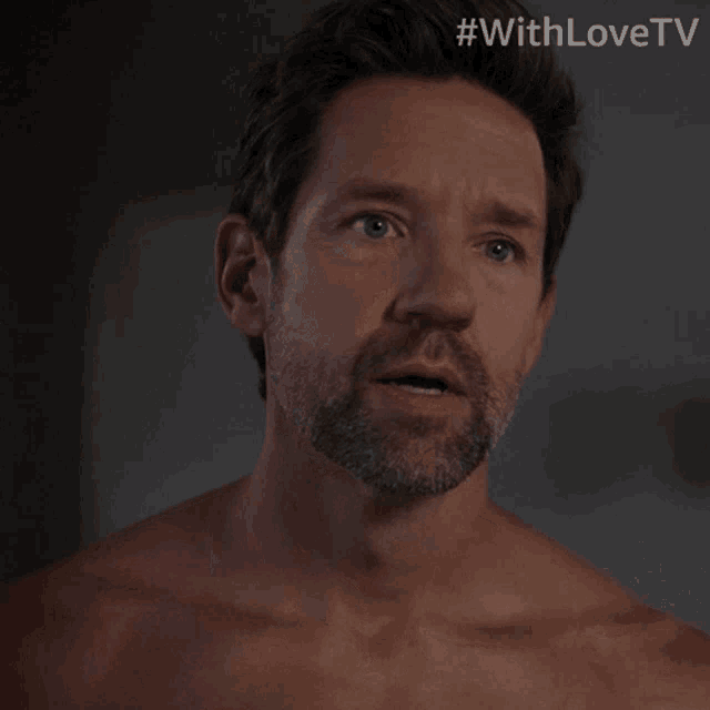 a man without a shirt has #withlovetv written on the bottom
