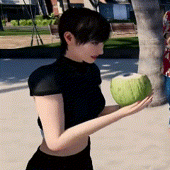 a woman in a black crop top is holding a green watermelon in her hands .