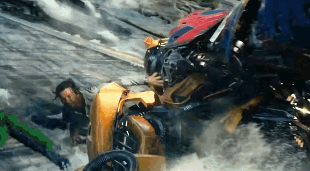 a man is standing next to a transformer in the water .
