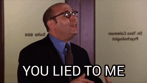 a bald man wearing glasses and a suit says you lied to me