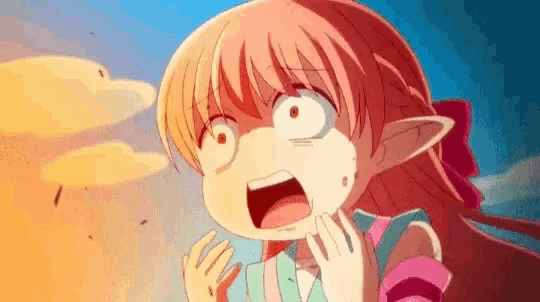 a girl with long red hair and ears is making a funny face .