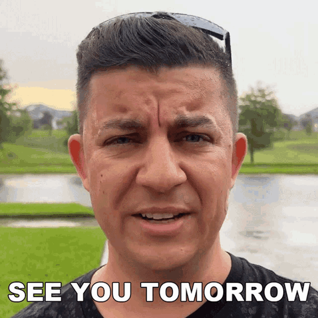 a man says " see you tomorrow " in front of a pond