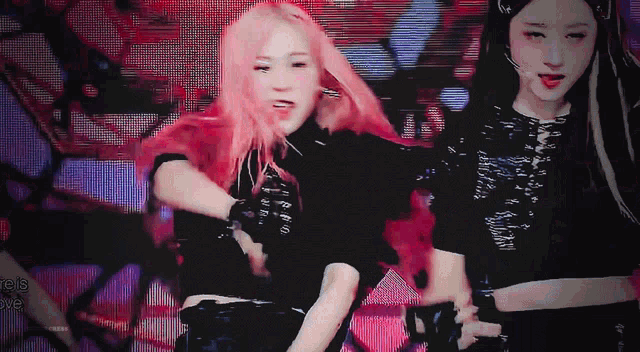 a girl with pink hair is dancing in front of a screen that says bye