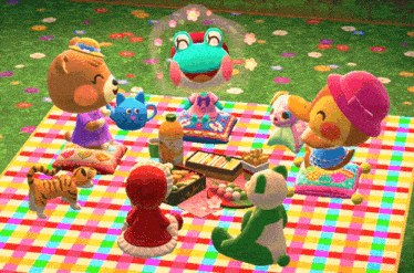 a group of stuffed animals are having a picnic together