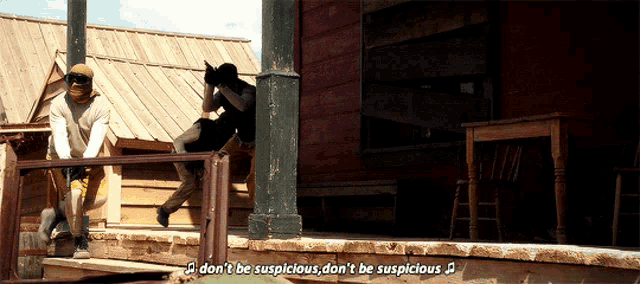 a man on a porch says " don 't be suspicious "