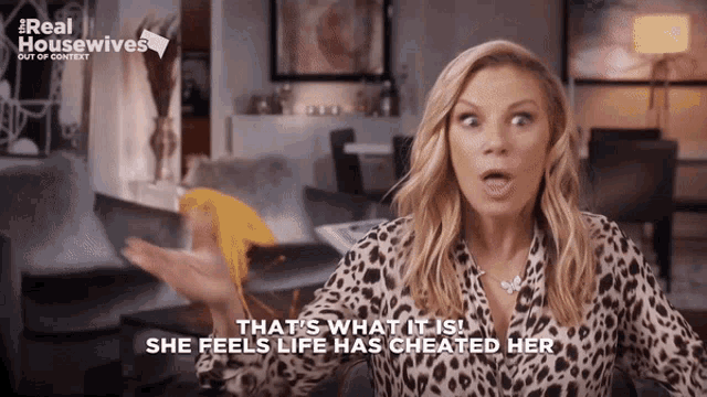 a woman in a leopard print shirt says that 's what it is