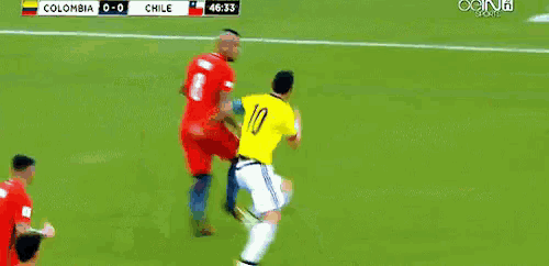 a soccer game between colombia and chile with the score 0-0