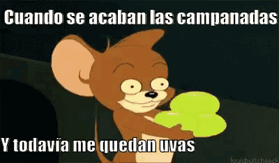 a cartoon of jerry holding a green object with the caption cuando se acaban las campanadas and todavia me quedan uvas