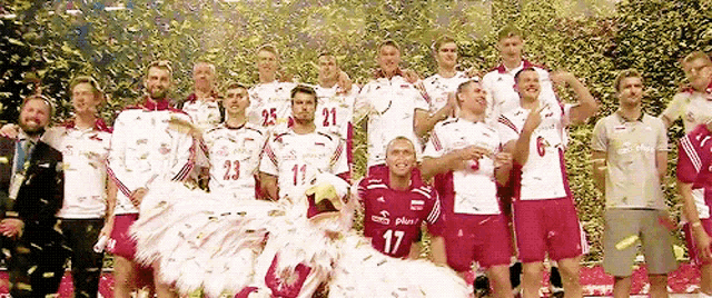 a group of soccer players are posing for a picture with one wearing a red jersey that says 17