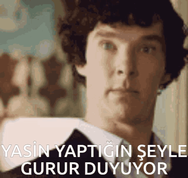 a close up of a man with the words yasin yaptigin seyle gurur duyuyor
