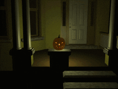a pumpkin with a face carved into it is sitting on a pedestal