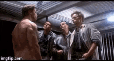 a group of men are standing around a naked man .