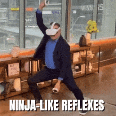 a man wearing a virtual reality headset is dancing with the words ninja-like reflexes below him