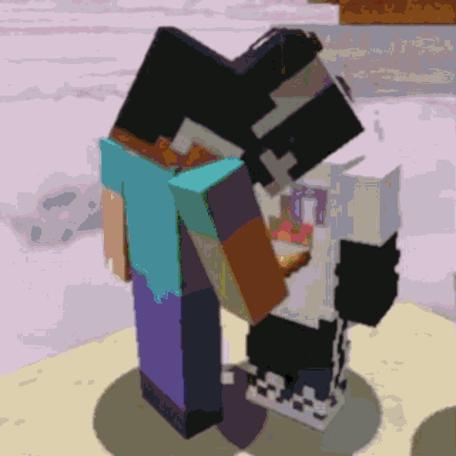 a couple of minecraft characters are standing next to each other on a beach .