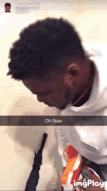 a snapchat of a man holding a gun with the words oh naw at the bottom