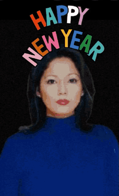 a woman wearing a blue sweater with the words happy new year written on it