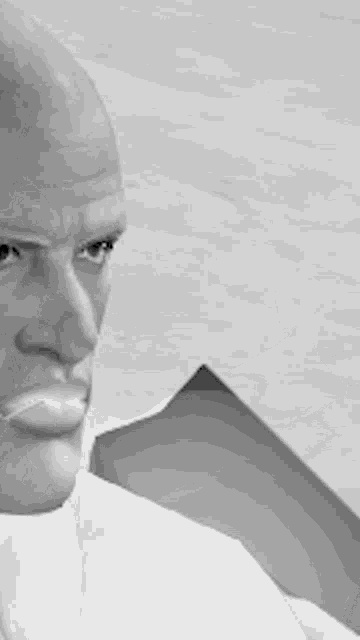 a black and white photo of a bald man in a white suit