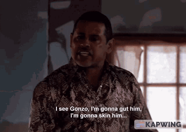 a man in a snake print shirt says i see gonzo i 'm gonna gut him