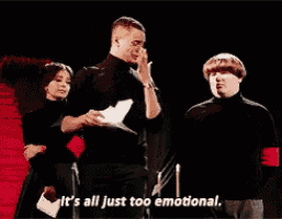 a group of people standing on a stage with the words it 's all just too emotional