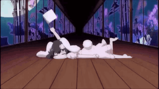 two anime characters are laying on a wooden floor in a hallway