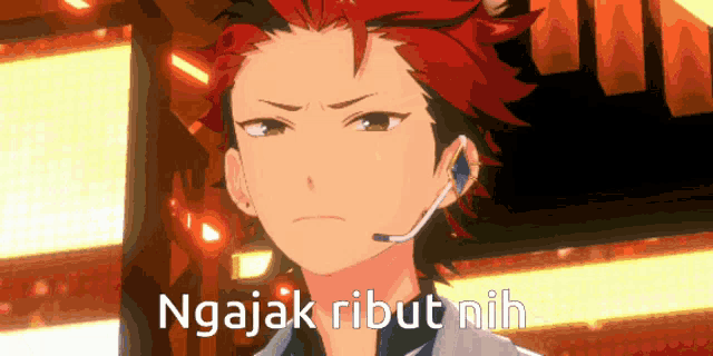 a man with red hair is wearing a headset and the words ngajak ribut nih are written below him