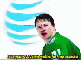 a man wearing a green shirt with the number 21 on it