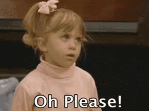 a little girl is wearing a pink turtleneck and a pink bow in her hair .