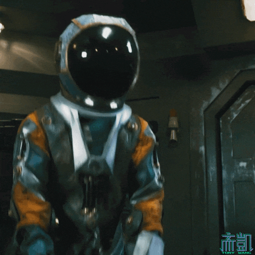 a man in a space suit is standing in front of a sign that says " ling wang "