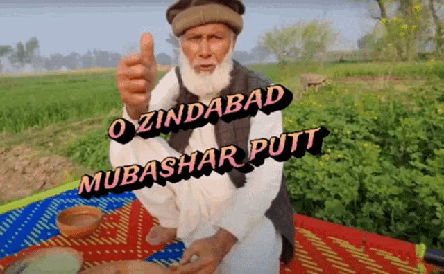 a man giving a thumbs up with the words o zindabad mubashar putt on the bottom