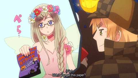 a girl in a flower crown is holding a bag that says halloween
