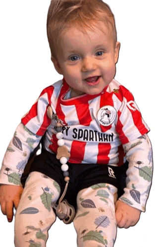 a baby wearing a red and white spartan shirt