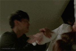 a blurry photo of a man being punched by a woman with the caption chakakyeo on the bottom