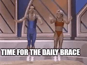 a man and a woman are jumping in the air with the words `` time for the daily brace '' behind them .