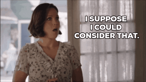 a woman says i suppose i could consider that in front of a window