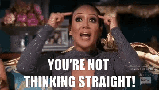 a woman sitting on a couch with her hands on her head and the words you 're not thinking straight