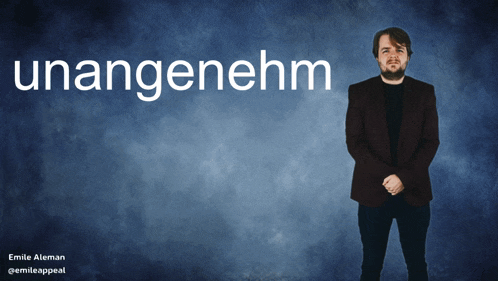a man in a suit stands in front of a blue background with the word unangenehm in white letters