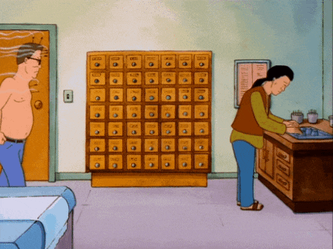 a cartoon of a man and a woman in front of a dresser with drawers labeled ' a '
