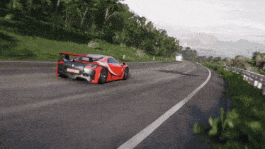 a red and black sports car with a license plate that says ' lgc ' on it