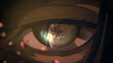 a close up of a person 's eye with a light coming out of it